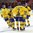 HELSINKI, FINLAND - DECEMBER 26: Sweden's Rasmus Asplund #18 celebrates with Alexander Nylander #19, Dmytro Timashov #17 and Marcus Pettersson #7 after scoring Team Sweden's fifth goal of the game during preliminary round action at the 2016 IIHF World Junior Championship. (Photo by Matt Zambonin/HHOF-IIHF Images)


